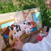 В деревне. Книжка-панорамка с окошками